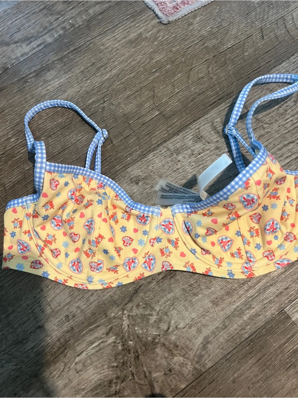 Frankie’s bikinis vs pink buttercup bikini top in yellow and blue